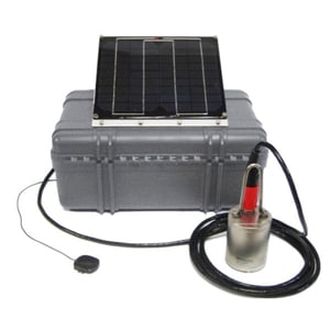 Deployment Kit shown with seismometer attached externally via cable and solar panel sitting upright on the case