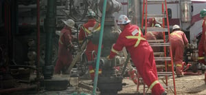 Oil drilling crew working on a well