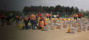 Large group of scientists working on a multi unit seismic station deployment