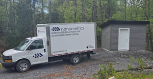 Nanometrics service van beside testing site