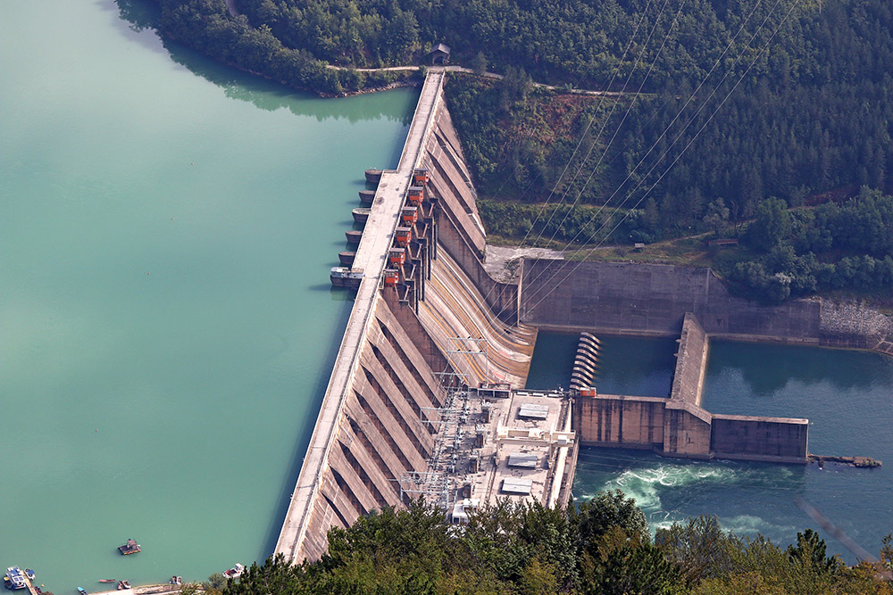 Large hydroelectric dam with water moving through it