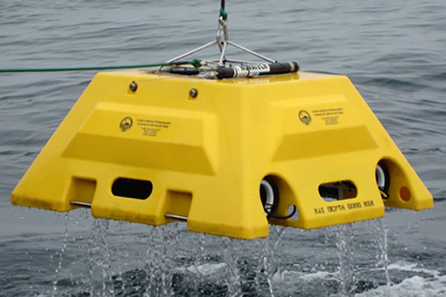 Abalones OBS station being removed from the water by a mounted cable